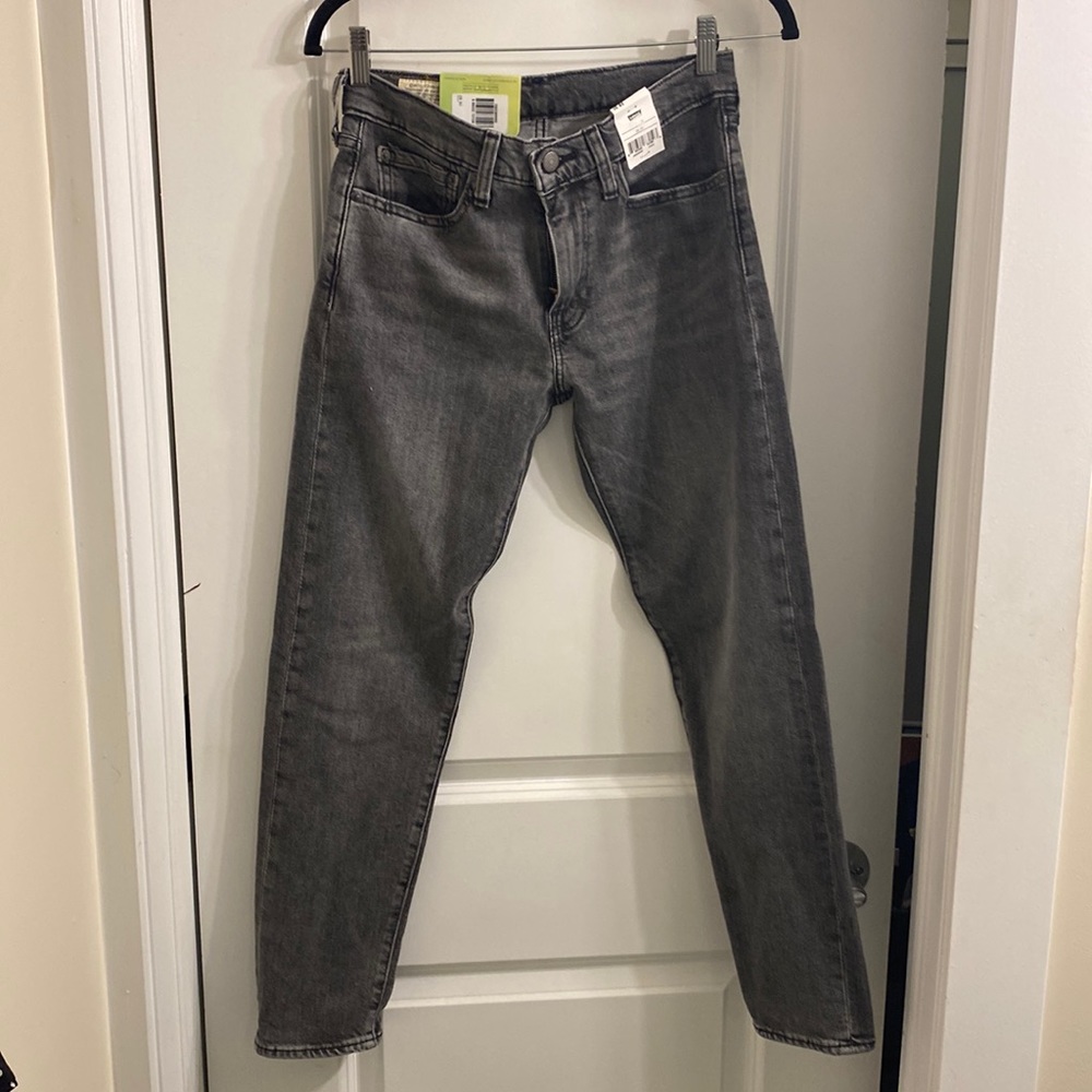 NWT, Levi’s 512 Slim Taper jeans in gray-black 28 waist 30 Length. Never worn